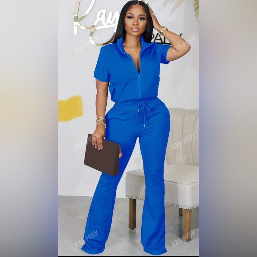 Zip Up Top & Drawstring Blue
Size: 14 (XXL) Two Piece
